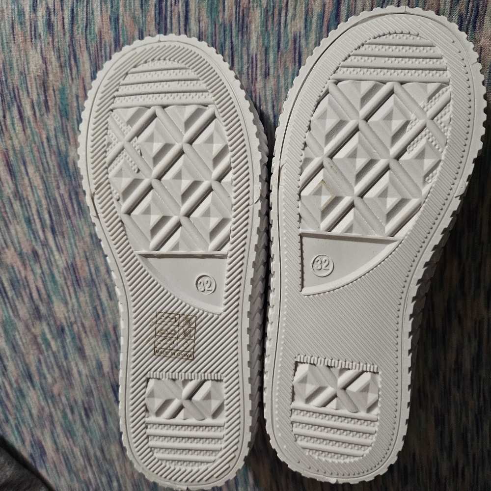 Sporty solid white tennis shoes